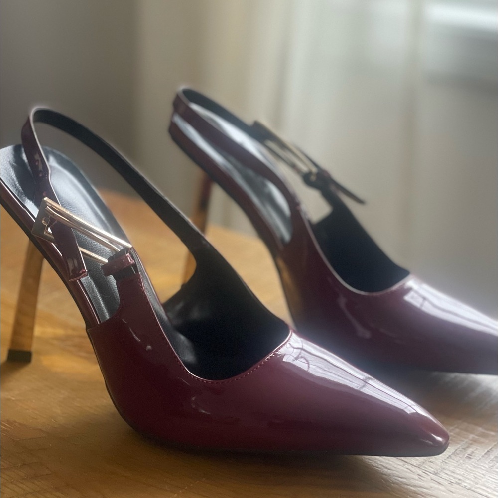 Brand new, never worn burgundy patent leather high heals